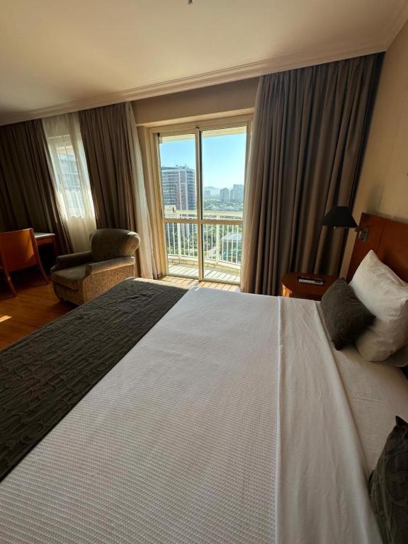 Flat Com Vista Panoramica -15- Na Barra Da Tijuca - Estacionamento Gratuito - Frigobar - Ar Condicionado - Piscina - Academia - Balsa Para Praia Gratis - Varanda - Vista Parcial Mar E Lagoa Rio de Janeiro Buitenkant foto